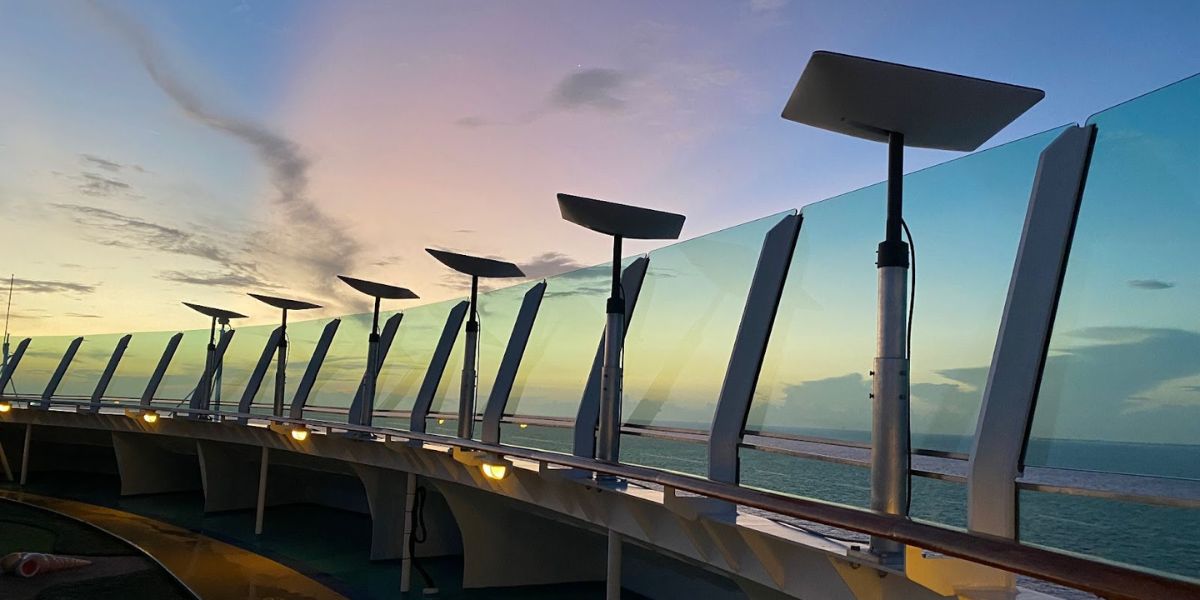 Celebrity cruise ship wifi routers lined up together with a back drop of a beautiful sky.