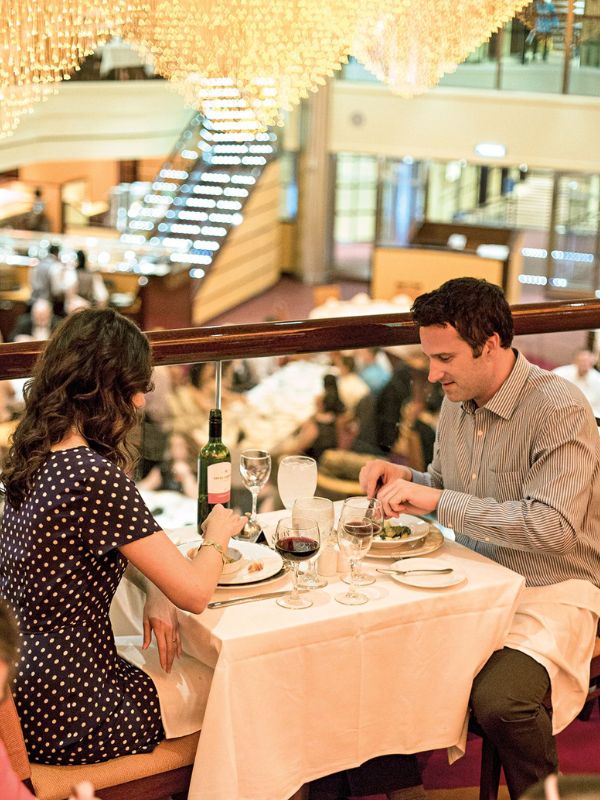 honeymooners eating at Speciality restaurant on a Carnival ship