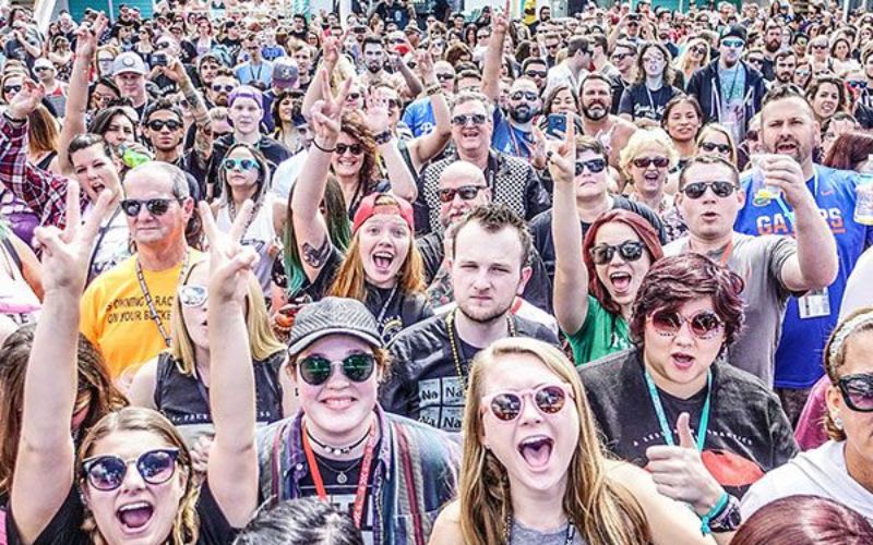 crowd enjoying listening to a band