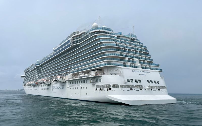 flat bottom cruise ship sailing at sea