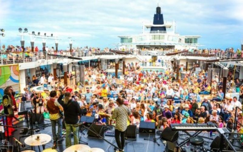 People on the cruise ship enjoying the music