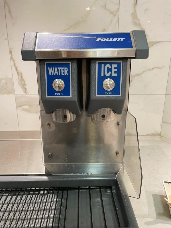 water and ice dispenser in the buffet on a cruise ship