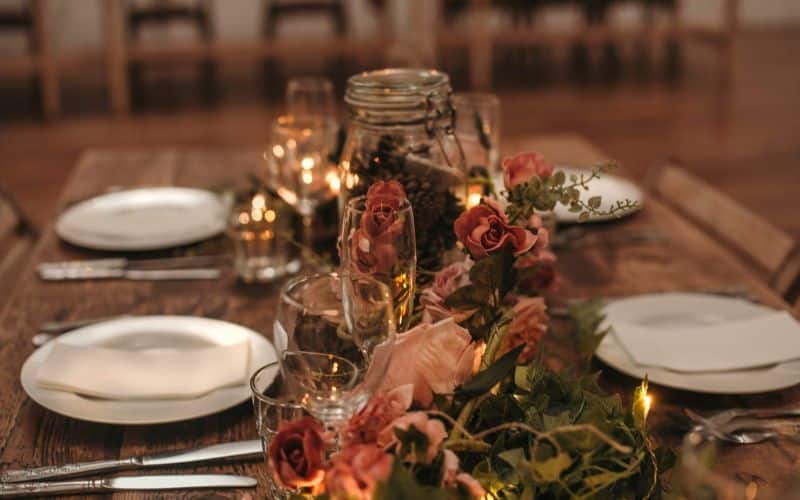 Simple wedding table decorations inside the private venue onboard