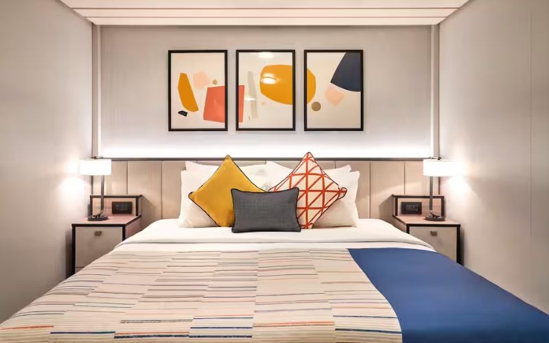 A huge bed situated at an inside cabin