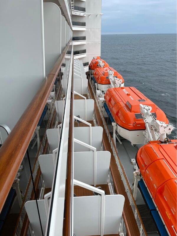 lifeboats on the side of MSC Virtuosa