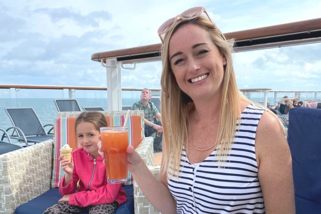 Me with a drink on a Royal Caribbean cruise