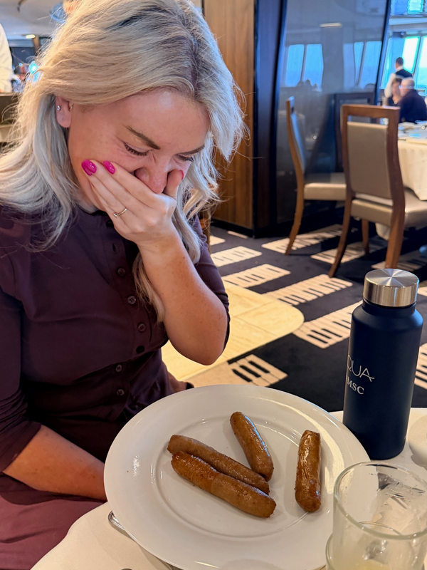 My friend with four sausages in the MSC Virtuosa dining room