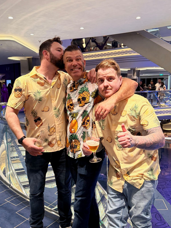 Men wearing pineapple shirts