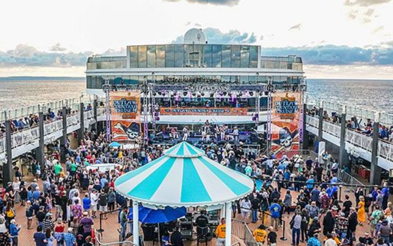 People on the cruise ship enjoying the music