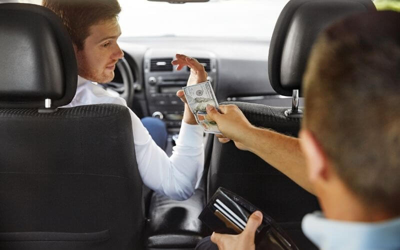 paying for taxi with cash