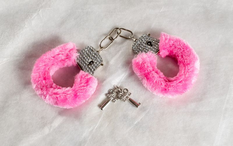 pink fur handcuffs and keys