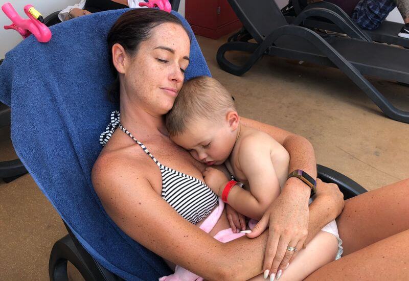 Me and baby Adam taking a nap on a cruise ship