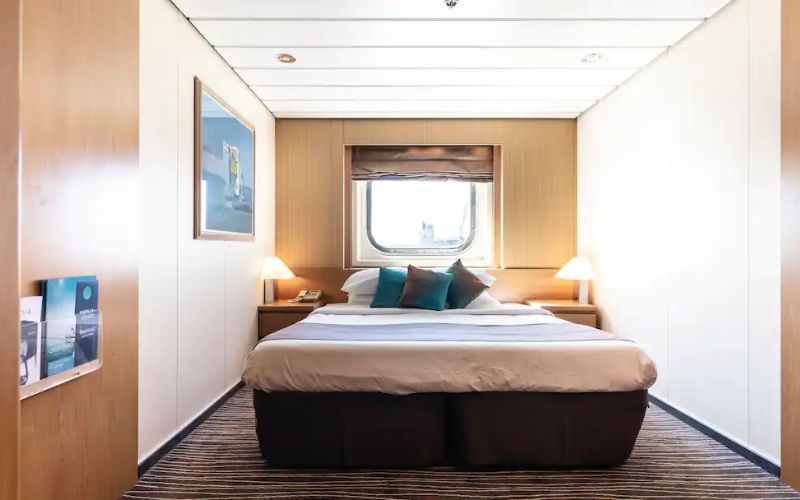 A single bed inside a single cabin