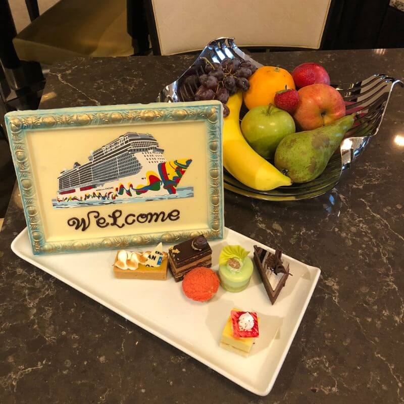 Welcome fruiy bowl and canapes on Norwegian Encore.