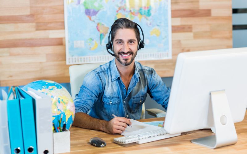 a smiling travel agent