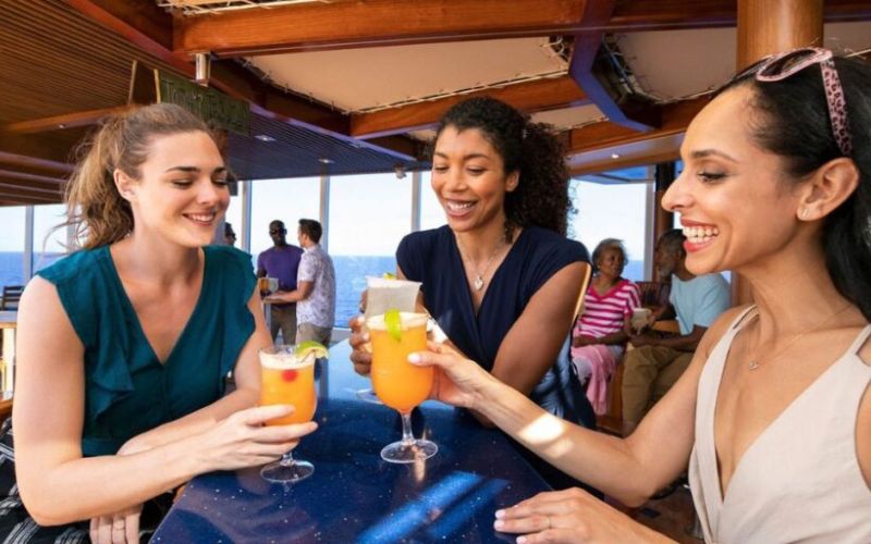 woman having drinks at Carnival Cruise's Blue Iguana Tequila Bar